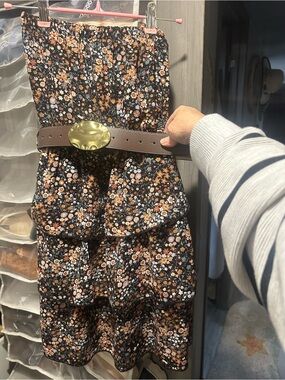 Fashion Magazine Black Floral Dress with Brown Belt and Gold Buckle